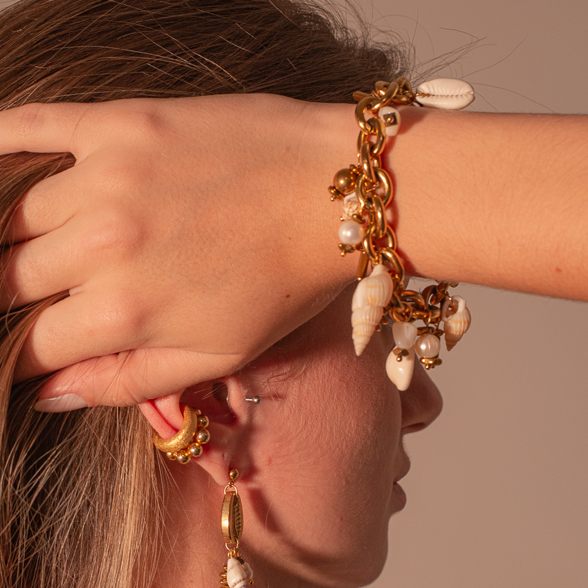 pulseira max conchas