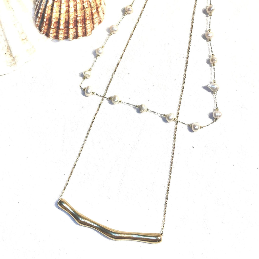 Long coral and gold necklace