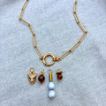 colar charms sementes